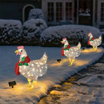 Wunderschöne Weihnachtsdekoration aufleuchtende Hähnchen mit Schal